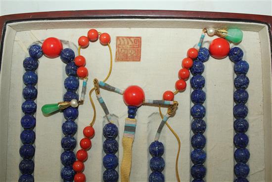 A Chinese lapis lazuli, jadeite and coral necklace, 31.5cm